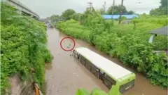 వరద నీట్లో బస్సు