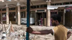 ኣብ ከተማ ውቕሮ ዝርከብ ጨንፈር ባንኪ ንግዲ ኢትዮጵያ፡ ኣብ እዋን እቲ ኲናት ብወተሃደራት ከም ዝተዘምተ ይግለጽ 