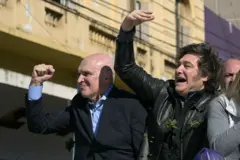 José Luis Espert e Javier Milei em um evento político.