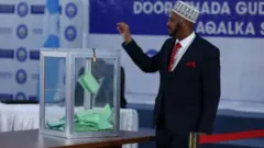 Members of the Senate vote to choose a speaker during an intense contest in Mogadishu