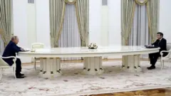 Putin (left) and Macron (right) meet in Moscow