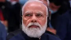 மோதி