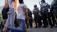 Protesters confront police in Washington DC