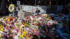 گل برای یادبود کشته‌شدگان مرکز خرید سیدنی