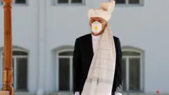 غني