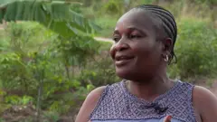 Mambote est une survivante du cancer du sein.