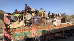 Afghan refugees in Pakistan have been streaming across the border into Afghanistan