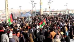 غور