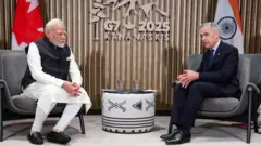  ਭਾਰਤ ਦੇ ਪ੍ਰਧਾਨ ਮੰਤਰੀ ਨਰਿੰਦਰ ਮੋਦੀ ਅਤੇ ਕੈਨੇਡਾ ਦੇ ਪ੍ਰਧਾਨ ਮੰਤਰੀ ਮਾਰਕ ਕਾਰਨੀ
