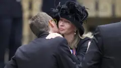 Guests arrive ahead of the State funeral of Queen Elizabeth II at Westminster Abbey on September 19, 2022 in London, England.
