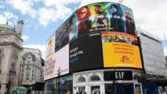 screens at Piccadilly Circus,