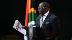 Finance minister Enoch Godongwana dey tok