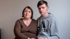 Tetyana Kraynyuk (left) and her son Sasha (right)