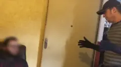 Policial durante a prisão de Lubasa