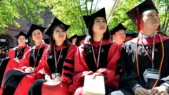 Graduación de estudiantes en Harvard en 2018.