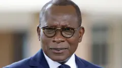 Perezida wa Bénin Patrice Talon ubwo yari yitabiriye ikiganiro n'abanyamakuru na mugenzi we w'Ubufaransa, mu ngoro ya perezida izwi nka La Marina, mu murwa mukuru Cotonou, ku itariki ya 27 Nyakanga (7) mu mwaka wa 2022