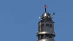 101 అంతస్తుల భవనం, సాహసకృత్యం, తైవాన్, అమెరికా