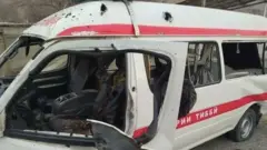 Миномёт снаряди келиб теккан Тез тиббий ёрдам автомобили