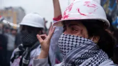 متظاهرة عراقية