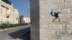 تصویر گرافیکی بر روی یک دیوار در شهر سدیروت، اسرائیل