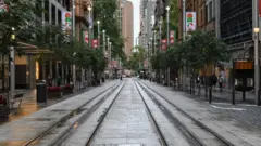 An empty George Street in the CBD as residents of Greater Sydney are asked to consider staying at home