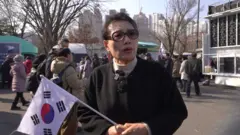 탄핵반대 시위에 참석한 한 시민