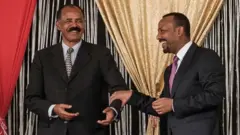 ፕረዚደንት ኢሳይያስ አፈወርቂን ቀዳማይ ሚንስትር ኣብዪ ኣሕመድን
