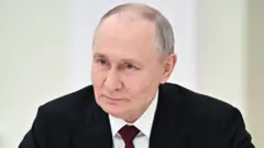 Путин