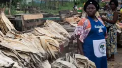 Market woman selling fish