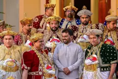 Sri Lanka's President Anura Kumara Dissanayake (C) and Sacred Tooth Relic Chief Custodian Pradeep Nilanga Dela (2L) attend a ceremony of handing over the Perahera message to the President for the successful conduct of the Esala Perahera festival at the President House in Kandy on August 9, 2025. 