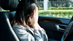 మహిళ