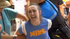 A woman being arrested