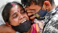 కోవిడ్ మృతుల కుటుంబాలు