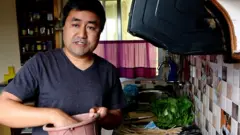 नबिन विकास महर्जन आफ्नो भान्सामा।