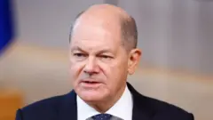 German Chancellor Olaf Scholz at a press conference