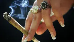 woman smoking marijuana