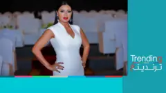 الفنانة المصرية رانيا يوسف مرتدية فستانا أبيضا