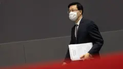 李家超：首名保安背景官員升任港府「二號人物」，引發「警察政府」擔憂