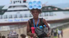 Internally displaced people arrive in Pemba on April 1, 2021, from the boat of evacuees from the coasts of Palma.