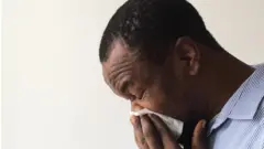 Onye na-akwa ụkwara