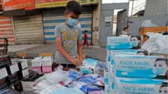 child selling Face Mask