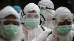 Medical staff wearing protective personal equipment in Indonesia