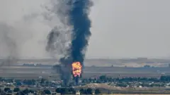 Ras'ul Ayn kentinden dumanlar yükseliyor