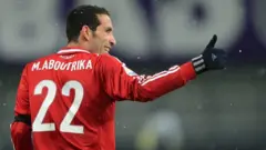 لاعب نادي الأهلي السابق محمد أبو تريكة