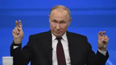 Путин