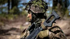 A soldier takes part in the military exercise Arrow 22 in Niinisalo, Finland on 4 May 2022