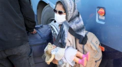 Seorang perempuan Afghanistan yang dideportasi dari Iran.