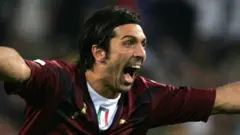 Italy goalkeeper Gianluigi Buffon playing football