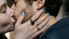 Man and woman kissing