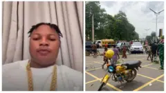 Oloogbe T Dollar lapa osi, o ṣerun rẹ bii ti dada. O wọ aṣọ funfun o si fi ẹgba ọrun si ọrun rẹ. Lapa ọtun ni awọn araalu to n ṣewọde pẹlu awọn mọto ati ọkada ti ko rọna lọ.